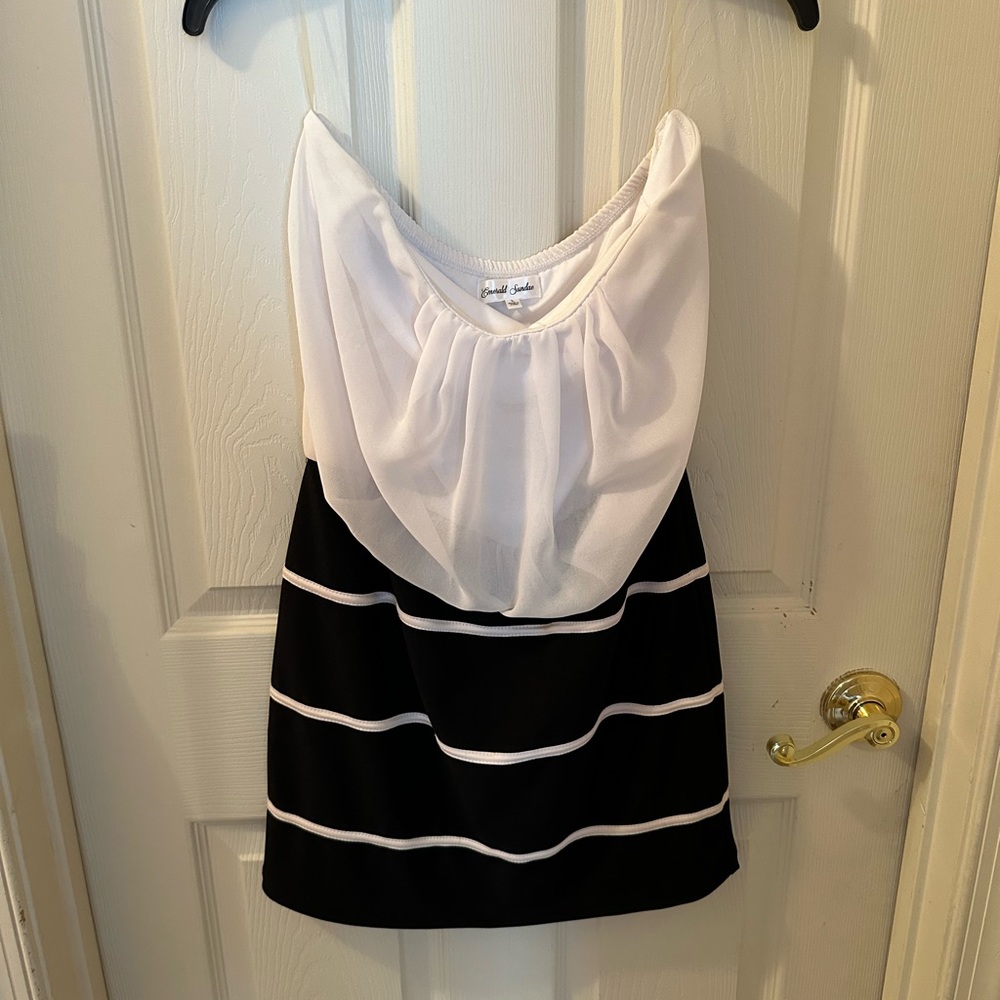A strapless mini white and black dress designed by Emerald Sundae. Size large.